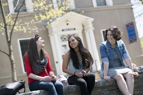 Students relax outside Messa House