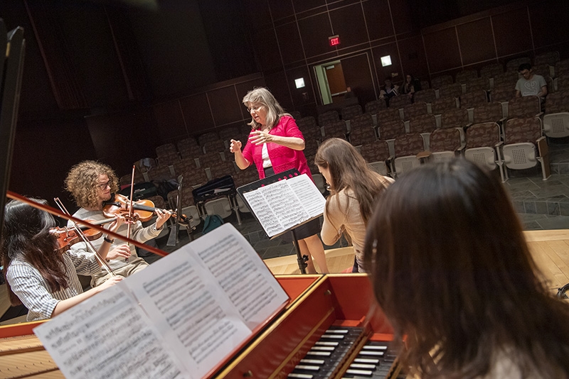A music ensemble performs in Taylor Music Center