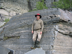 Kurt Hollocher standing in front of rock formation