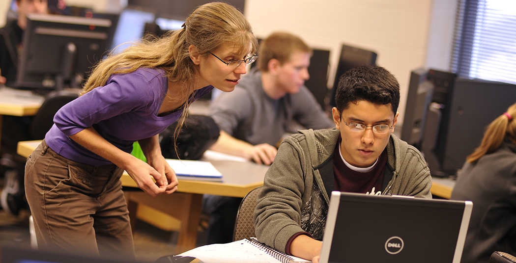 Professor Kristina I. Striegnitz instructs a student in class.
