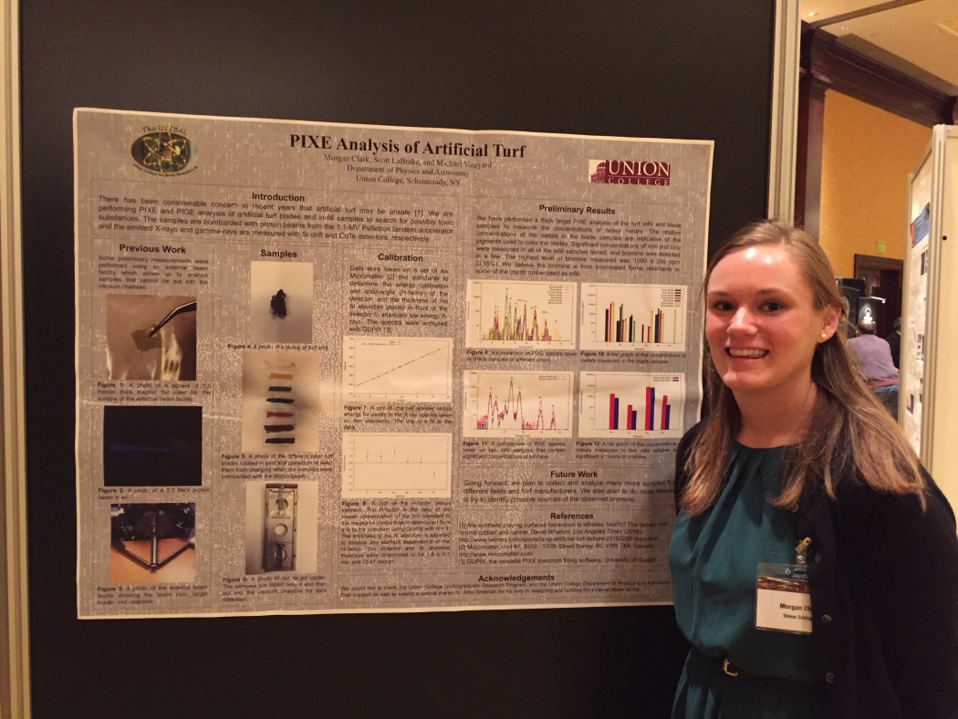 Morgan Caari standing next to chart PIXE Analysis of Artificial Turf
