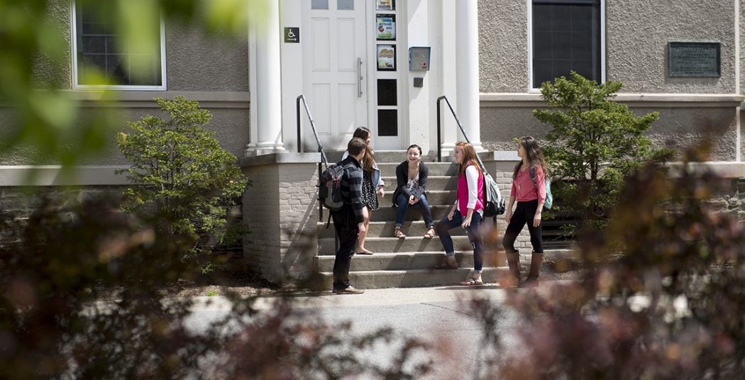 Students gather outside Green House