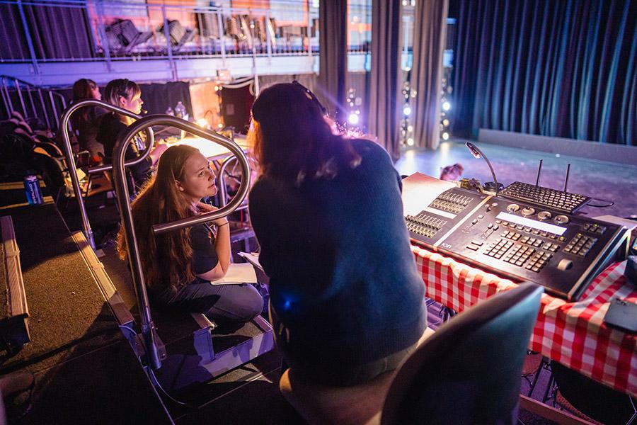 Ava DuBoff works backstage at her dance performance