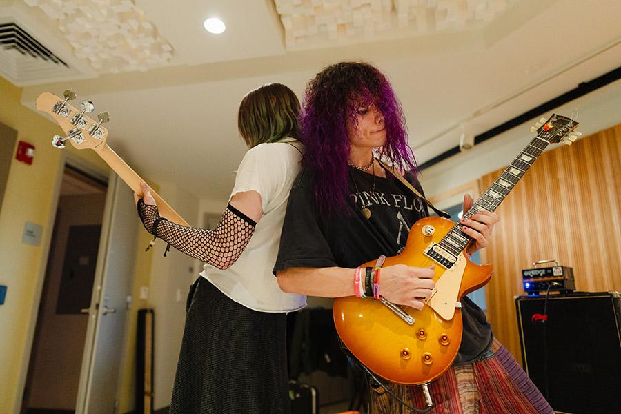 Students play the guitar in the TARDIS Lab