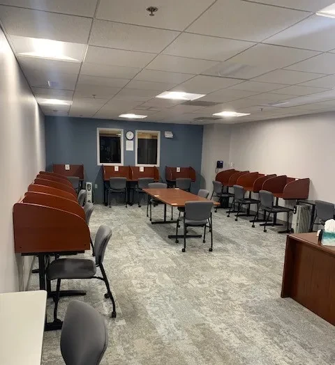 Testing Center with multiple carrels and tables for taking exams.