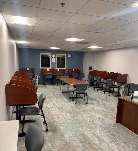 Testing Center with multiple carrels and tables for taking exams.