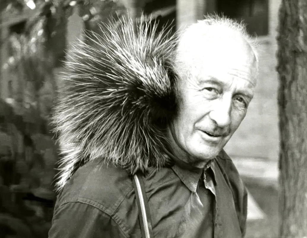 Forest Ranger with a porcupine on his shoulder