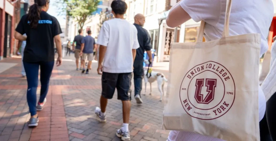 Students walking on Jay St. in Downtown Schenectady.