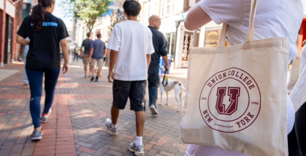 Students walking on Jay St. in Downtown Schenectady.