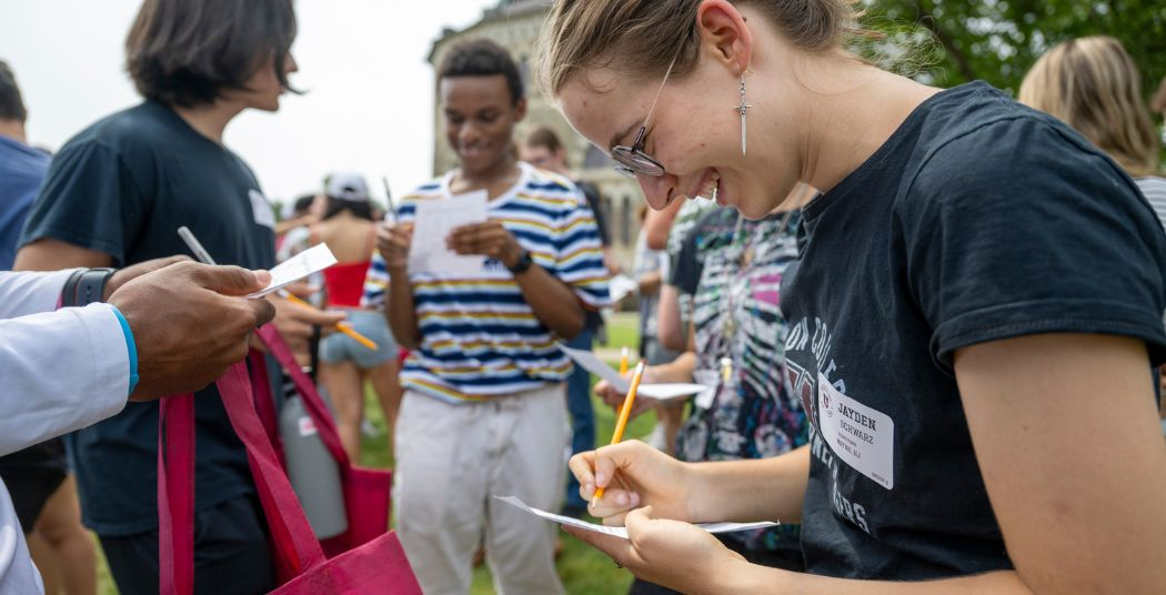 Incoming students at a welcome event on campus.