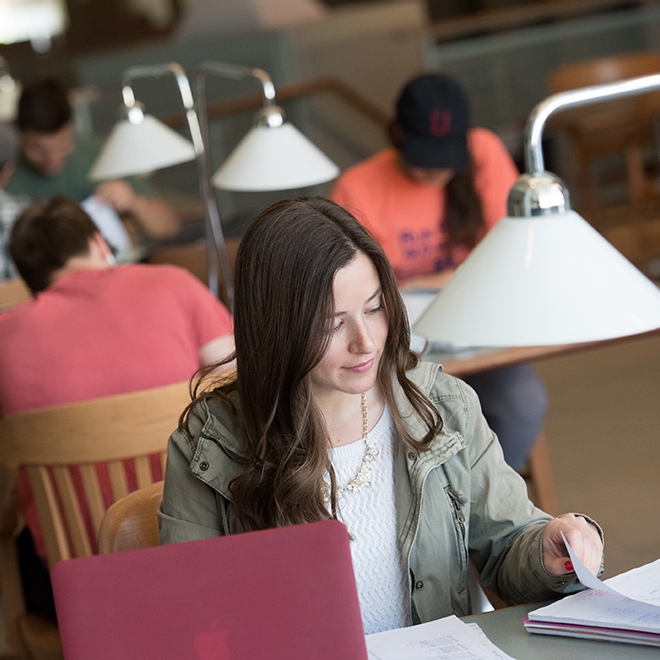 student studying in the library