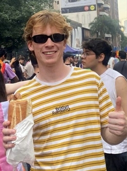 Daniel Buletza '26, pictured holding some bread while in Argentina