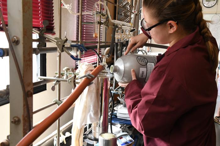 Samantha Gavin '19 works in Chemistry Professor Laurie Tyler's lab on her project, "Synthesis and Characterization of Isotopically Labelled Cobalt and Zinc Trans-Dicyano Complexes."