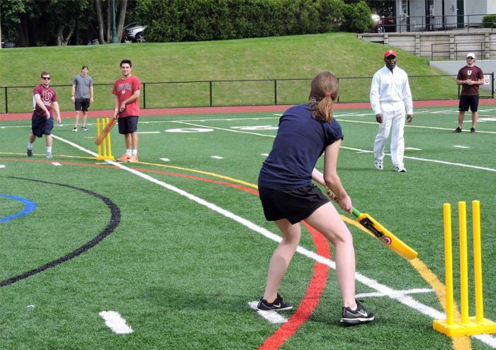 Students learn to play cricket