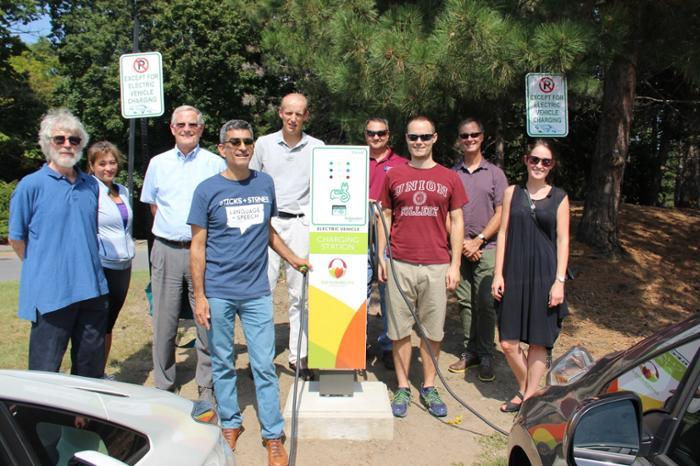 Daniel Mosquera, associate professor of Spanish and Latin American Studies, with other supporters of Union's new electric vehicle charging stations.