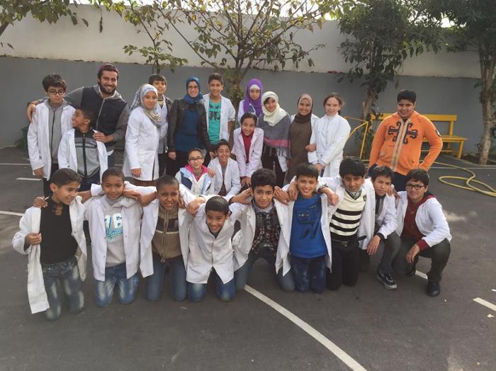 As an English language assistant in Rabat, Morocco, Roswald Morales '16 (top row, third from left) enjoyed interacting with his young students. In return, they taught Morales Arabic and some Moroccan history.