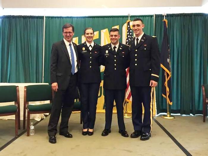 President Stephen C. Ainlay at the commissioning ceremony with Kate Kozain ’16, Stephen Hoeprich ’16 and Thomas Glading ’16