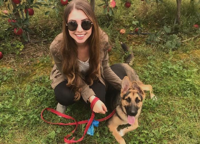 Sara Covelli with her service dog Shayna