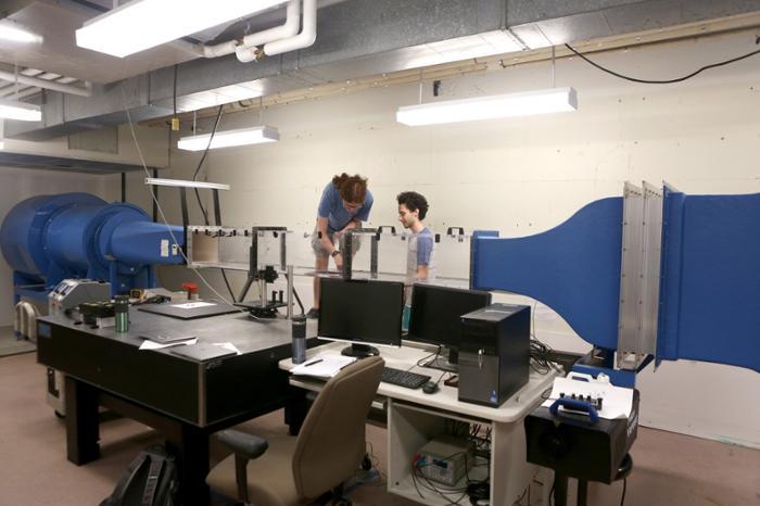 Lindsey Randle ‘20 and Adam Peterlein ’20 are using the wind tunnel in the College’s fluid mechanics lab to study turbulent flow over rough surfaces.