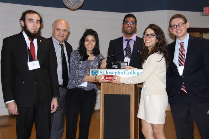 Chalmers Clark, adviser to Union's Ethics Bowl team (second from left) with members Andrew Forte, Raashika Goyal, Sahil Khullar, Dima Yankova and Marc Perlman.