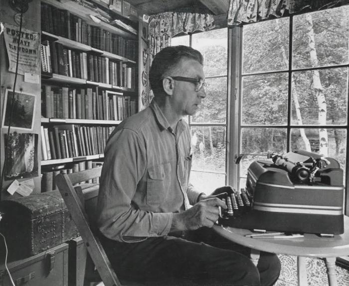 Noted conservationist Paul Schaefer works in his home office in 1950; the home is now part of the Kelly Adirondack Center.