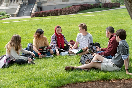 Union students enjoying a conversation near the Nott Memorial.