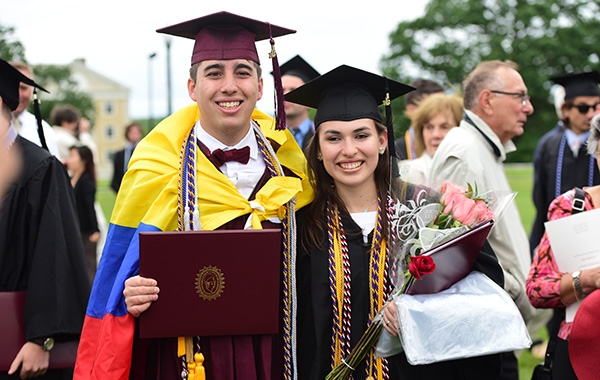 Union students show off their diplomas after receiving them