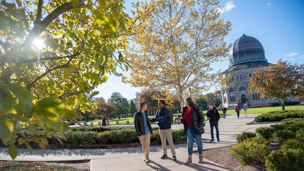 Students walking across campus one fall day