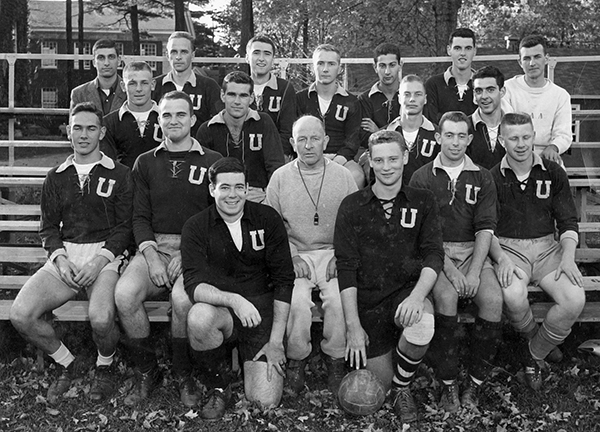 Howard Rosenkrantz ’57 (second row, second from right, beside Coach Franz Gleich) sits with the 1957 soccer team.