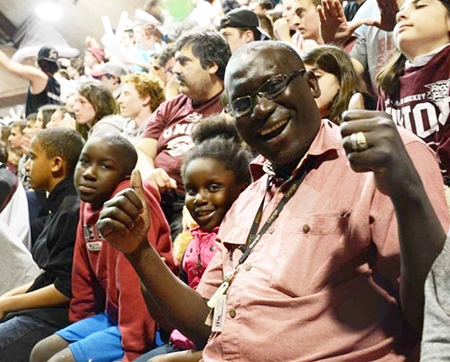 Cheikh Ndiaye and his family enjoy a Union hockey game