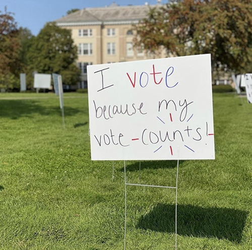 A campus sign encouraging students to vote