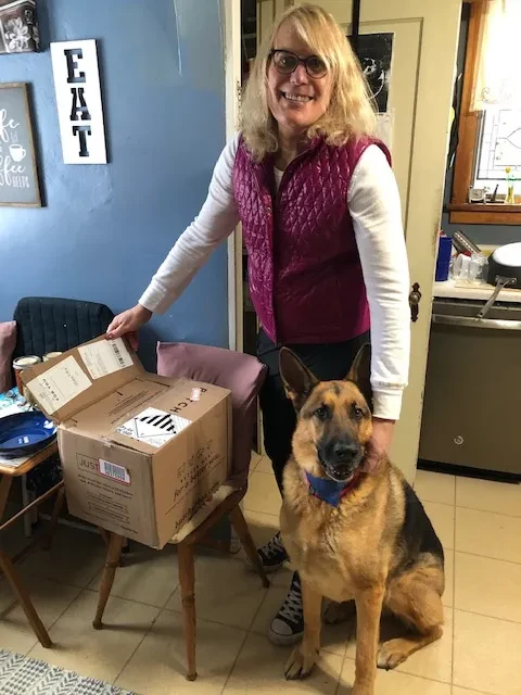Brianne Brinker with Baron, her eight-year-old German shepherd.