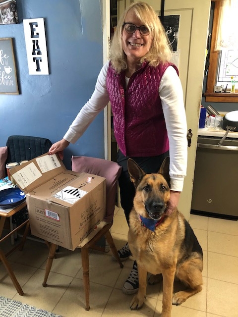 Brianne Brinker with Baron, her eight-year-old German shepherd.