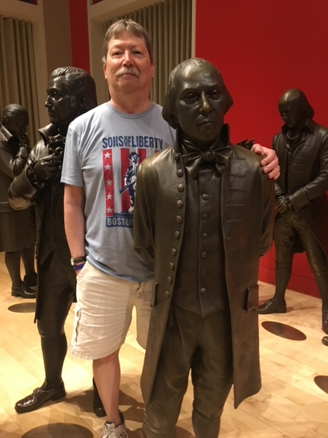 Professor Ken DeBono stands with President James Madison at the National Constitution Center in Philadelphia.