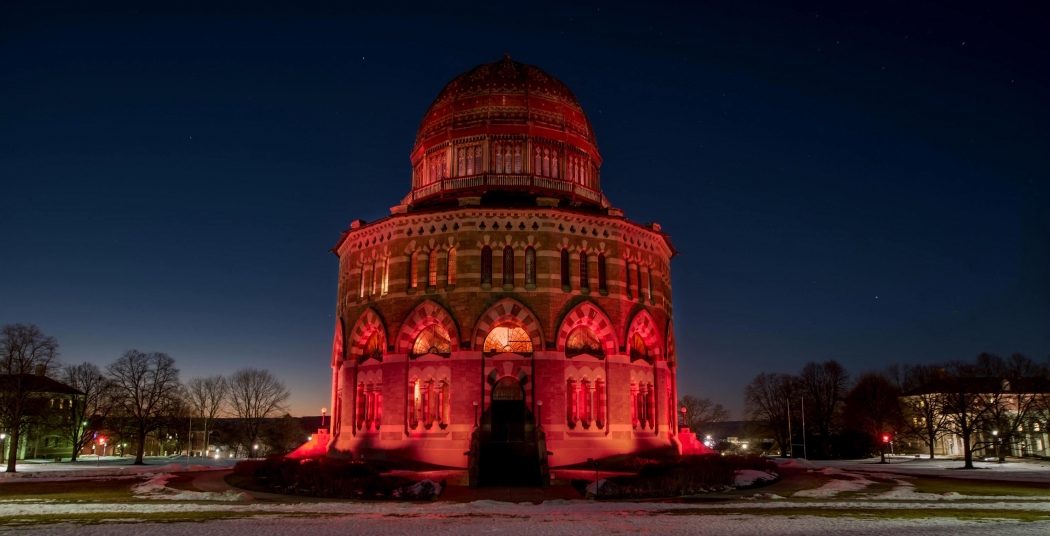 The Nott Memorial bathed in garnet