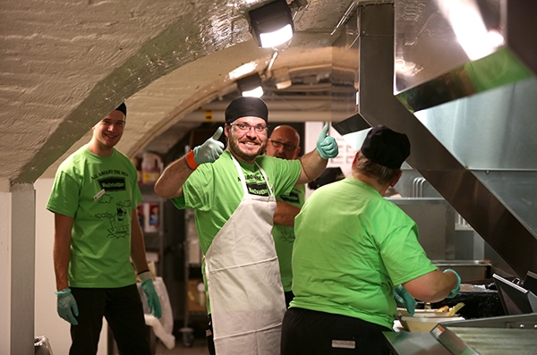 A worker in the Rathskeller gives the thumbs up