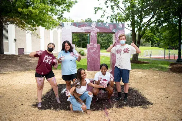 Students painting the new U 