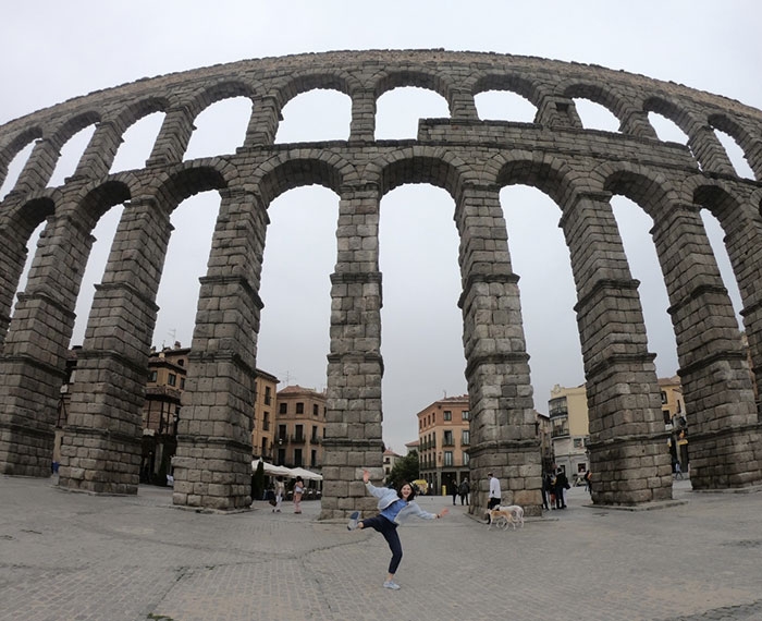 Catherine Seaman '22 is pictured at the Roman aqueduct of Segovia in Spain.