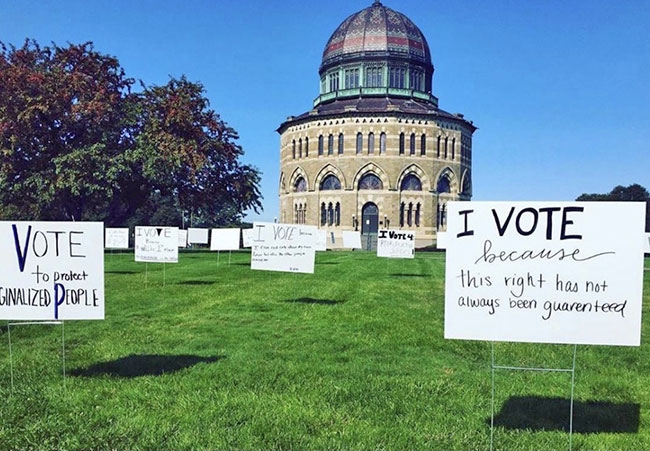 Signs in front of the Nott that state why it is important to vote.