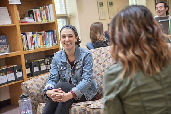 A student meeting with a career advisor at the Becker Career Center