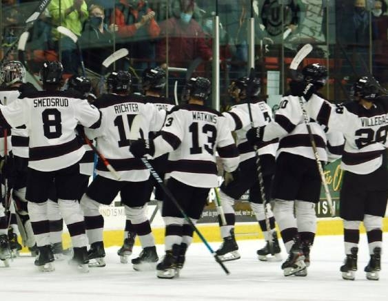 Men's hockey celebrate championship win