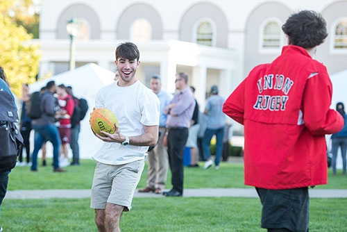 Students playing a pick-up game of rugby
