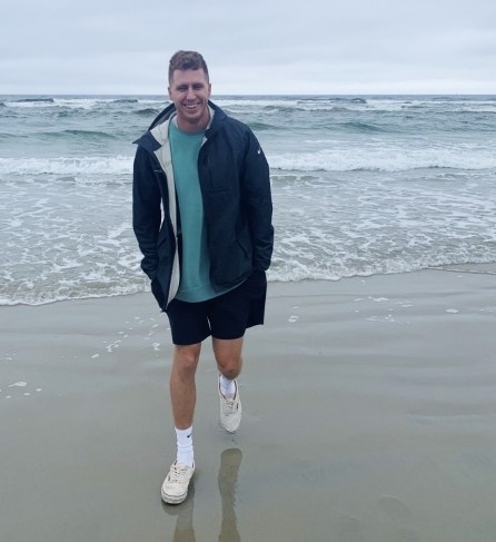 This photo shows James Ropitzky on a beach