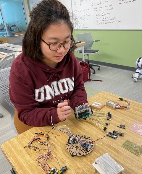 Jia (Scarlett) Wei ’23 works on a robot ahead of the annual Institute of Electrical and Electronics Engineers (IEEE) Region 1 Micromouse Competition Saturday. This is the first time Union has hosted the competition, which features students from a handful of schools.