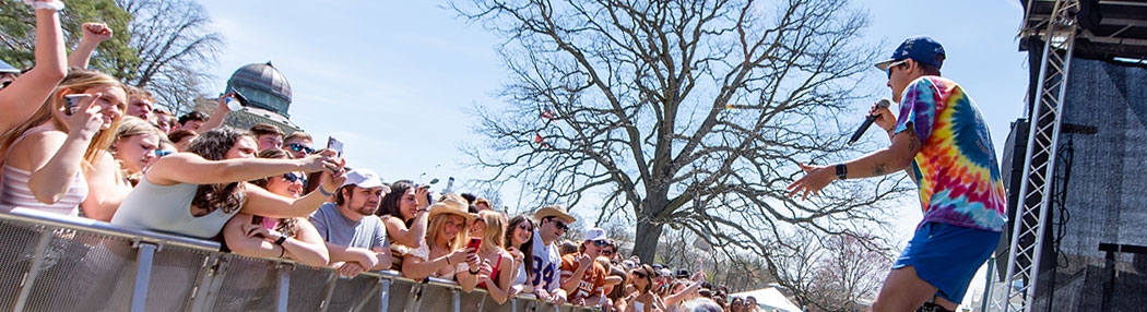 Enthusiastic students cheering on a Springfest performance