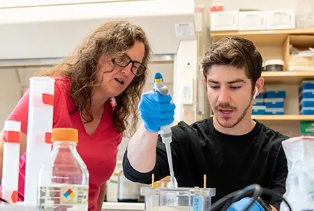 Summer Reseearch - Luke Miranda ’23 with professor Kristin Fox in the lab