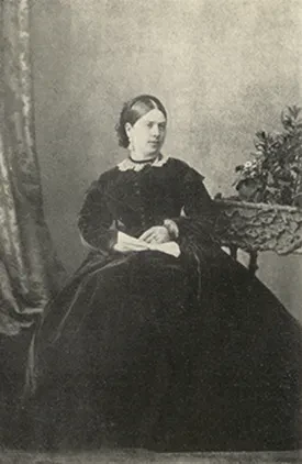 Bigelow woman in photo sitting in chair