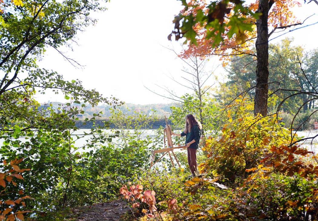 A student paintinf at Lock 7 Park on the Mohawk River