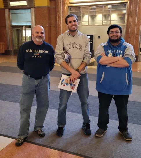 Nathan Kruth, right, with his father, Robert and brother Andrew, during a visit to the Cincinnati Museum of Natural History Museum and Science