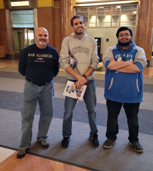 Nathan Kruth, right, with his father, Robert and brother Andrew, during a visit to the Cincinnati Museum of Natural History Museum and Science